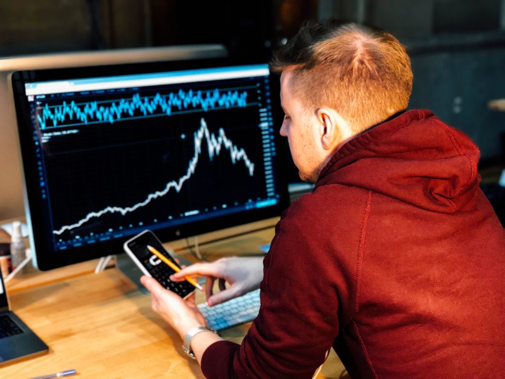 Man researching cannabis stock investments.