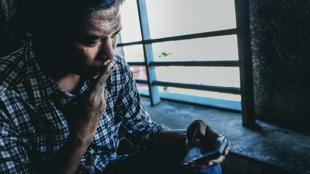 Old man smoking weed after cannabis legalization in Canada