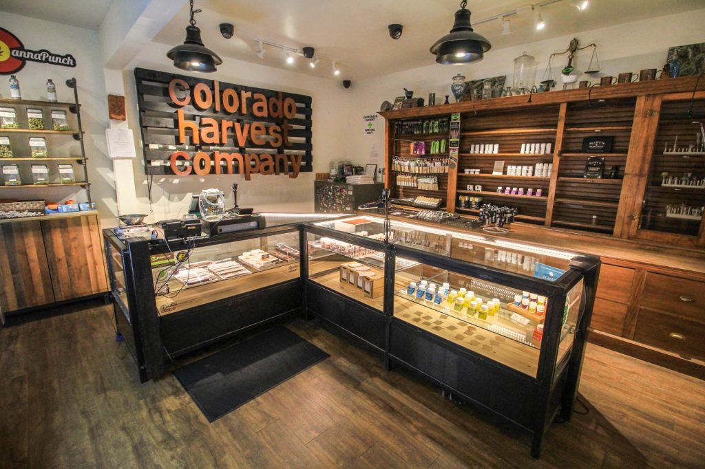 a cannabis dispensary in Colorado representing the comparison between Colorado and Michigan's cannabis sales