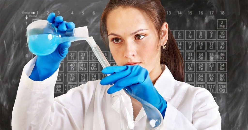 a scientist with a beaker and a flask, representing research for cannabis startups in Brazil