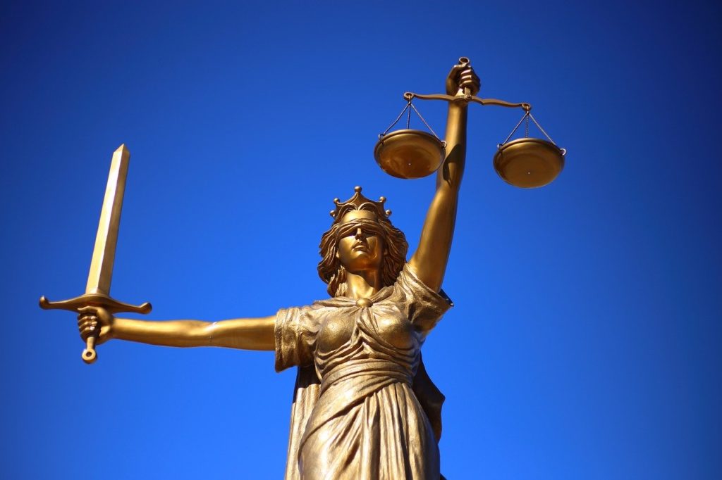 Lady justice depicting laws that make it hard for cannabis banking. 